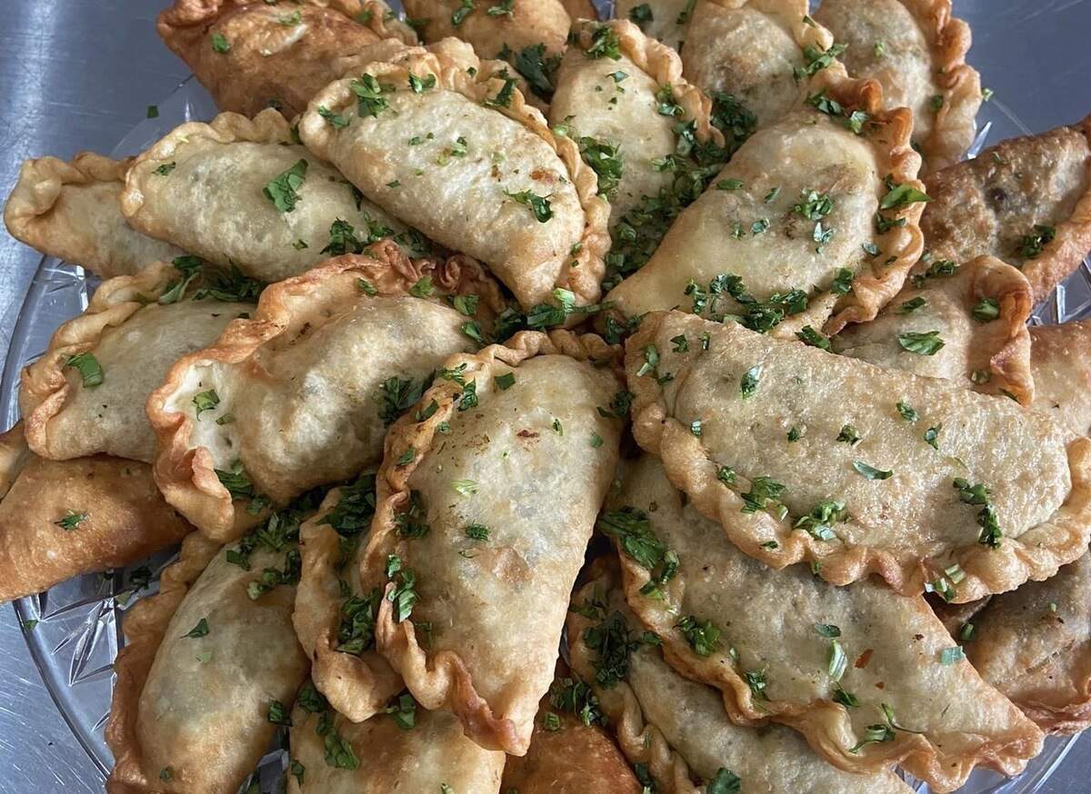 Trini Plate serves an array of Trinidadian food, including these homemade beef patties, at Tacoma events including Proctor Farmers Market. Owner Abby Woods is a co-organizer of Caribbean Queens Festival.